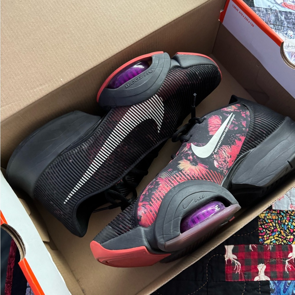 Black and floral Nike Men’s shoes - 11.5
